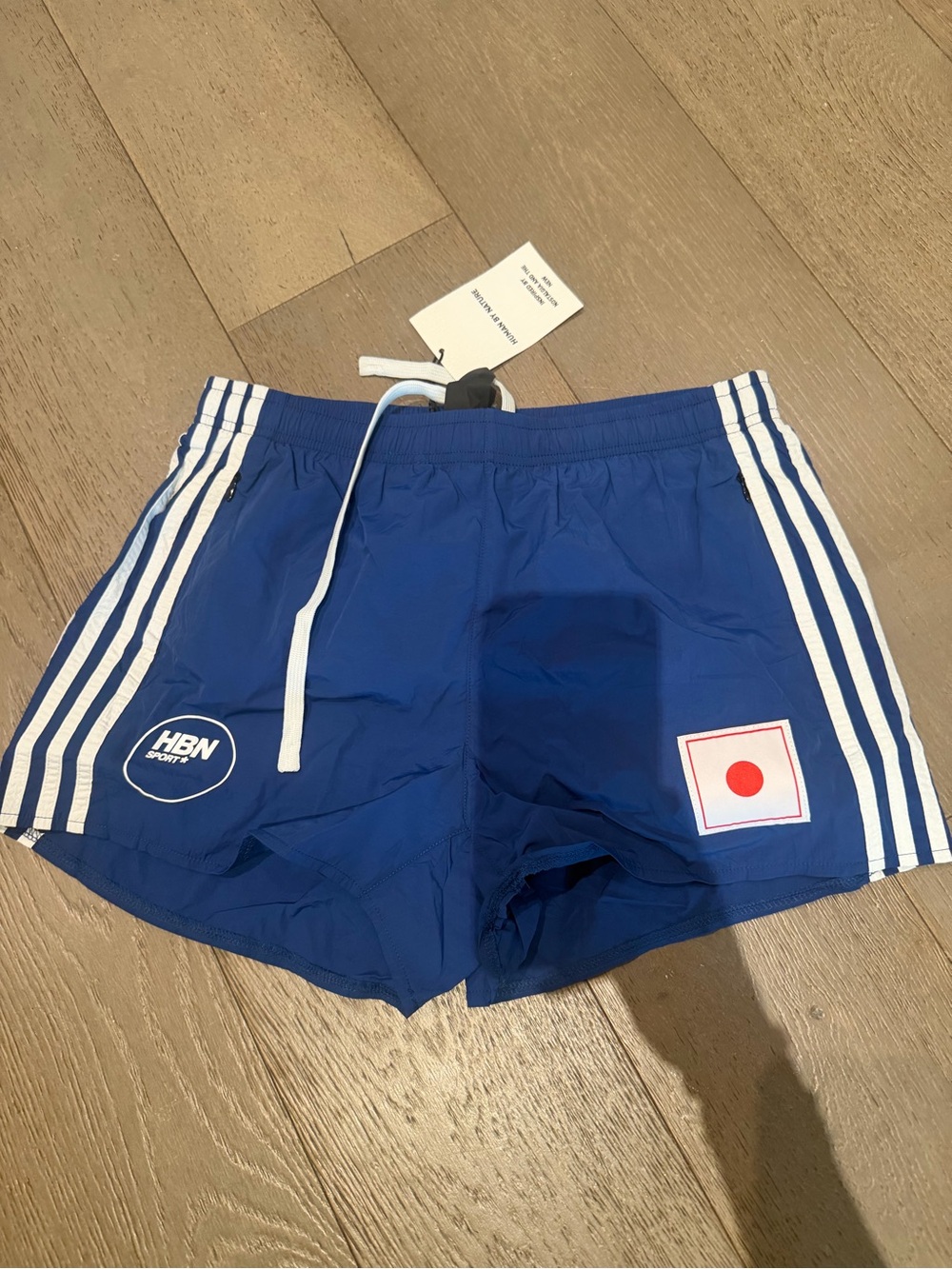 Men's Blue Athletic Shorts with White Stripes and HBN Sport Logo